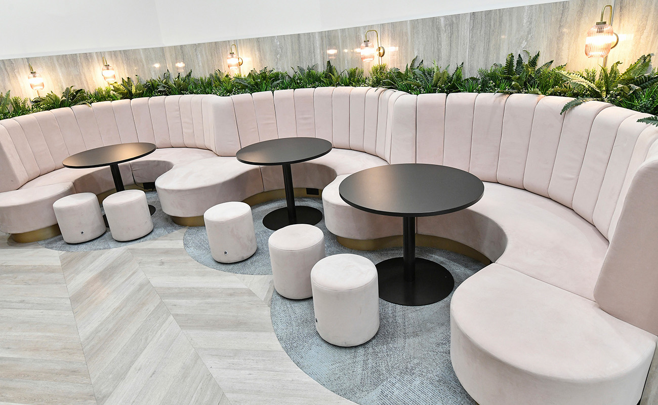 Seating area near reception and elevators at Bank House.