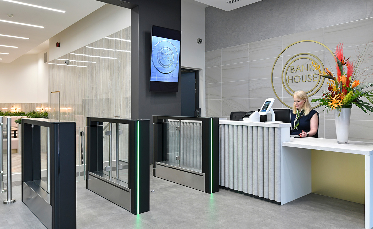 Manned reception and pass card security gates for the refurbished offices at Bank House.