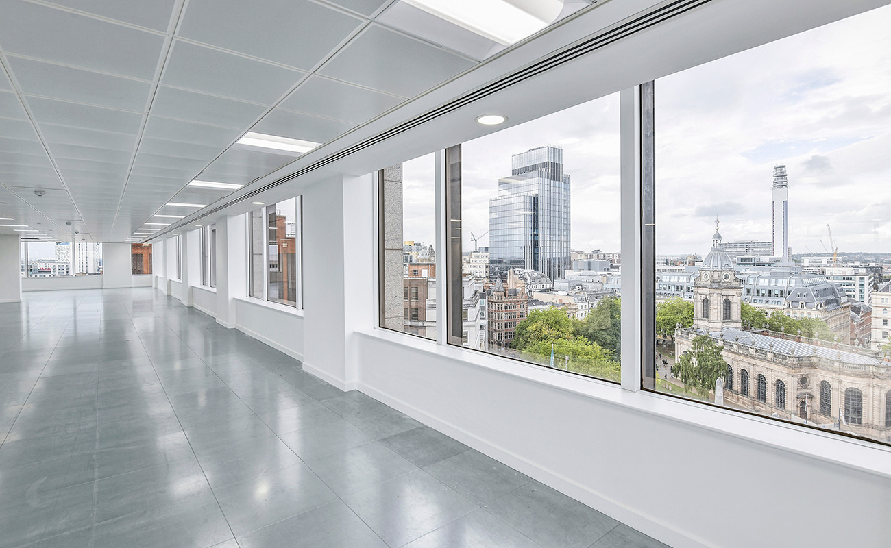 Empty floorplate, with views across the centre of Birmingham, for the refurbished offices at Bank House.