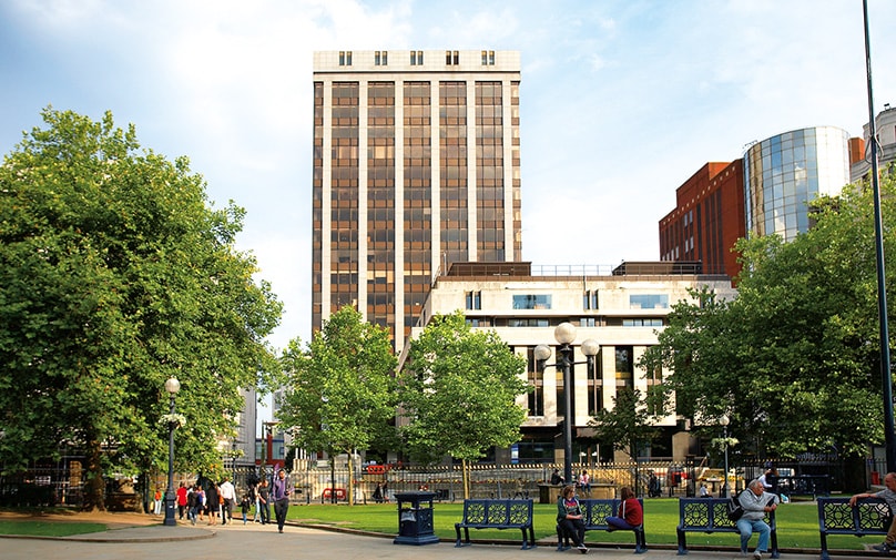Bank House office building in background of St Philips Square in Birmingham city centre